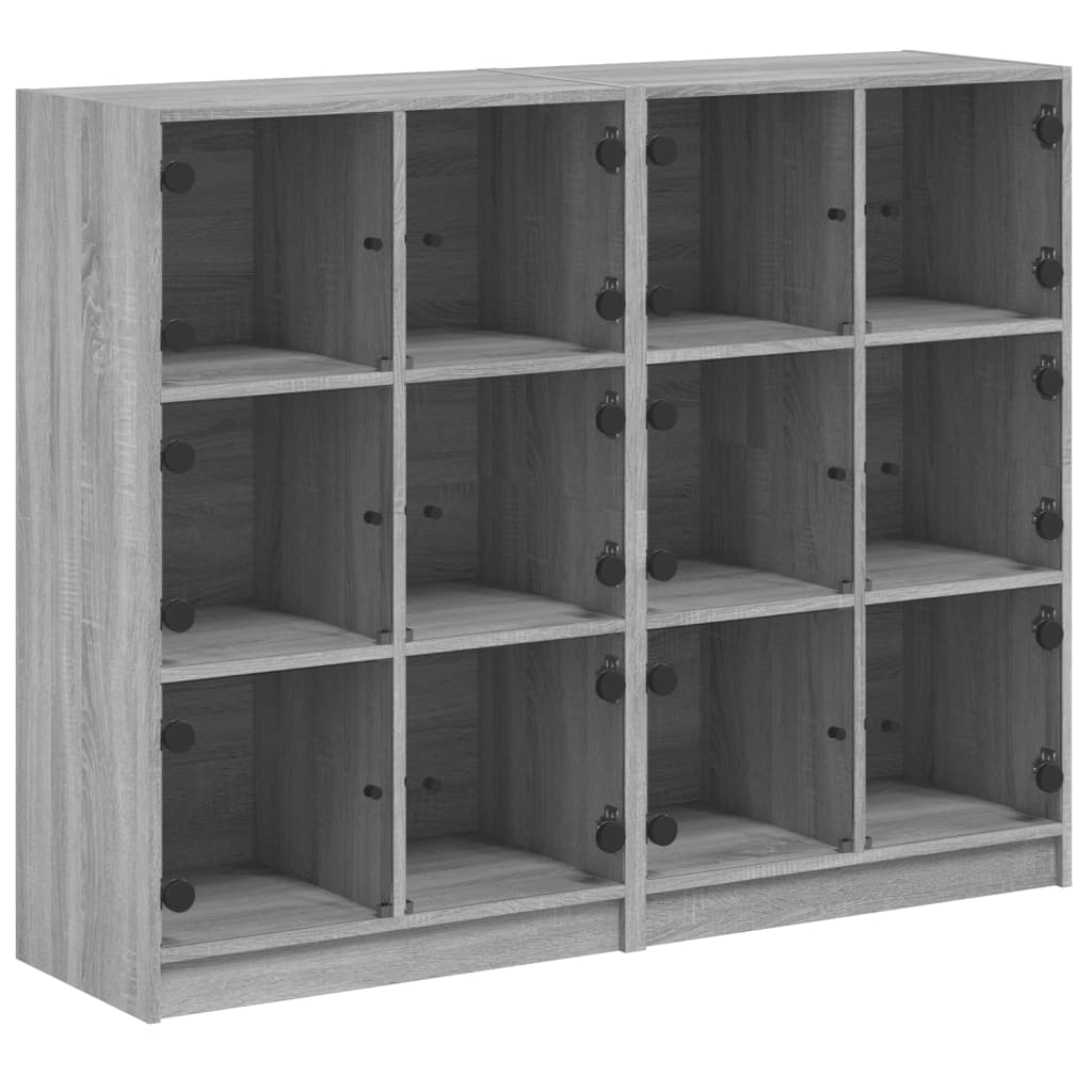 szürke sonoma szerelt fa könyvespolc ajtókkal 136x37x109 cm (3206515)