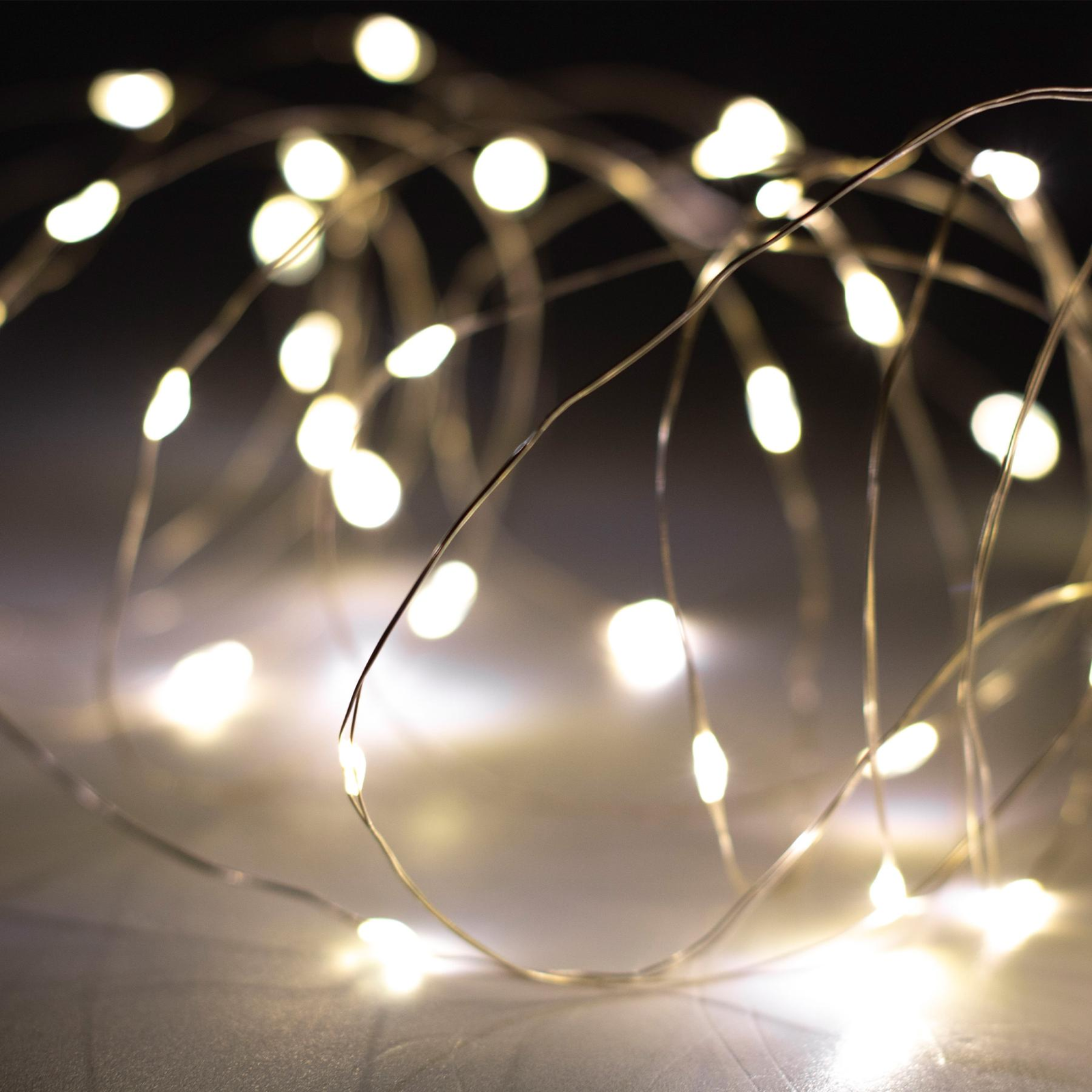 Home Kül.- és Beltéri Napelemes micro LED fényfüzér 5m - Melegfehér (SML100WW)